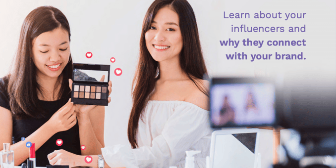 Two women filming themselves showing off various makeup products with the sentence "Learn about your influencers and why they connect with your brand" superimposed in purple text. 