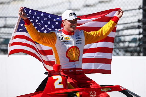 Josef Newgarden poses with Shell logo for Indy 500 winner photoshoot