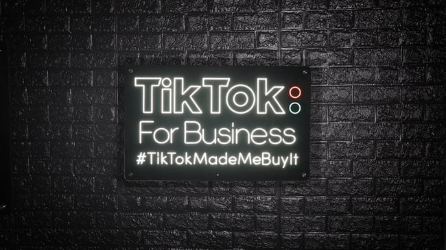 A sign that reads TikTok: For Business #TikTokMadeMeBuyIt