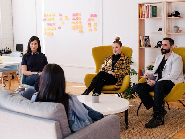 An influencer marketing team in an office, by Jason Goodman via Unsplash.