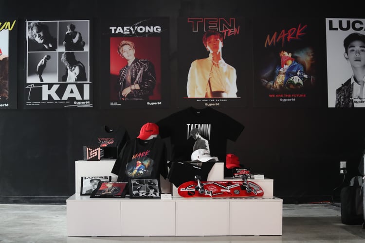 Popular K-Pop musicians on posters including Taeyong
