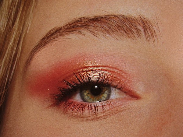A close-up of the eye of a Gen Z makeup influencer, by Yunona Uritsky via Unsplash.