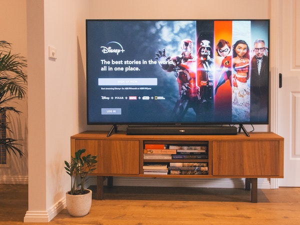 A TV displaying streaming service Disney+, which is trending on TikTok.